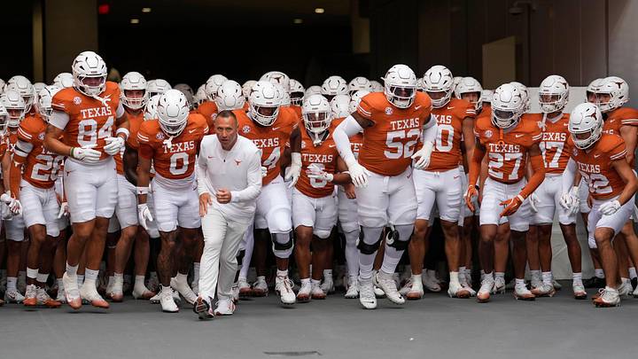 Sep 20, 2025; Austin, Texas, USA; Texas Longhorns head coach Steve Sarkisian leads his team onto the field before a game against the Sam Houston State Bearkats.