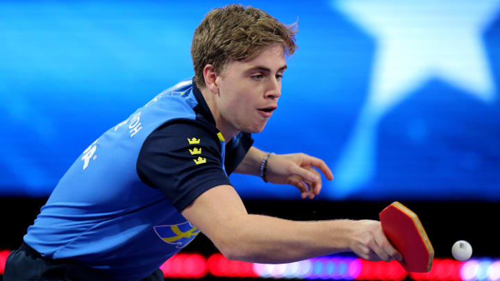 Nov 29, 2021; Houston, Texas, USA; Truls Moregard of Sweden plays the ball against Fan Zhendong of China during the men's singles final during the 2021 World Table Tennis Championships Finals at George R. Brown Convention Center. Mandatory Credit: Erik Williams-USA TODAY Sports 