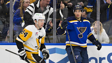 Apr 3, 2025; St. Louis, Missouri, USA;  St. Louis Blues center Jordan Kyrou (25) reacts after scoring against the Pittsburgh Penguins during the second period at Enterprise Center. Mandatory Credit: Jeff Curry-Imagn Images