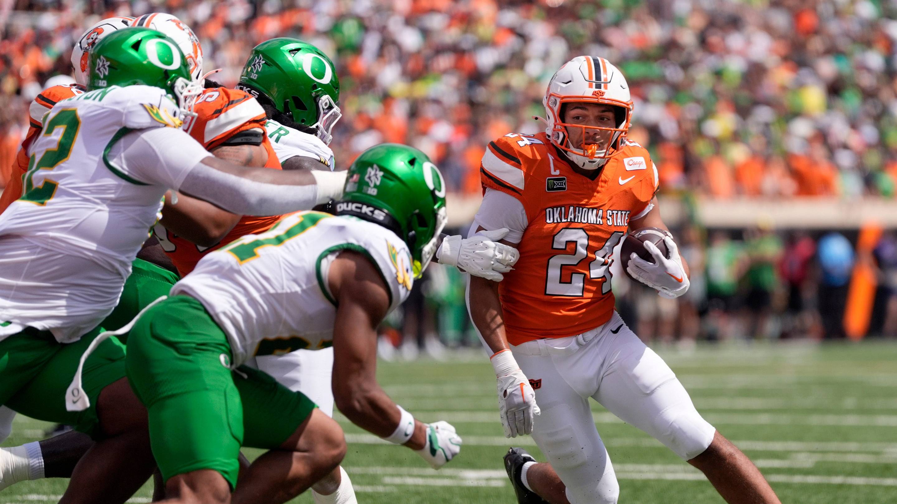 Oklahoma State's Caleb Hawkins (24) rushed in the first half of the college football game between the Oklahoma State Cowboys and the Oregon Ducks at Boone Pickens Stadium in Stillwater, Okla., Saturday, Sept., 12, 2026. | USA TODAY Network via Reuters Connect