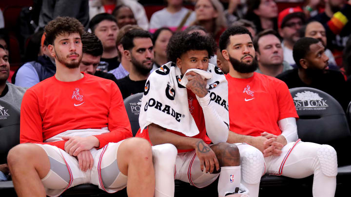 Dec 27, 2023; Houston, Texas, USA; (from L-to-R) Houston Rockets center Alperen Sengun (28), Houston Rockets guard Jalen Green (4) and Houston Rockets guard Fred VanVleet (5) sit on the bench during the fourth quarter against the Phoenix Suns at Toyota Center. Mandatory Credit: Erik Williams-USA TODAY Sports