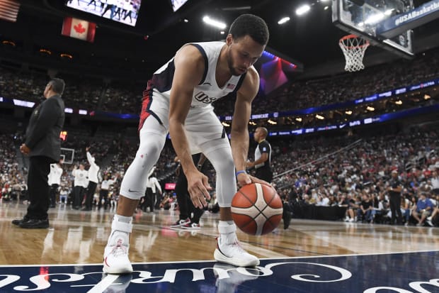 Team USA guard Stephen Curry dribbles during a game.