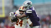Aug 23, 2025; Dublin, IRELAND; Iowa State player Abu Sama III is tackled by Donovan McIntosh of of Kansas State during the Aer Lingus Classic between Iowa State and Kansas State at Aviva Stadium. Mandatory Credit: Laszlo Geczo/INPHO via Imagn Images