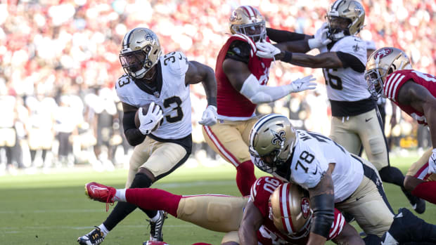 New Orleans Saints running back Jordan Mims (33) runs the ball against the San Francisco 49ers 