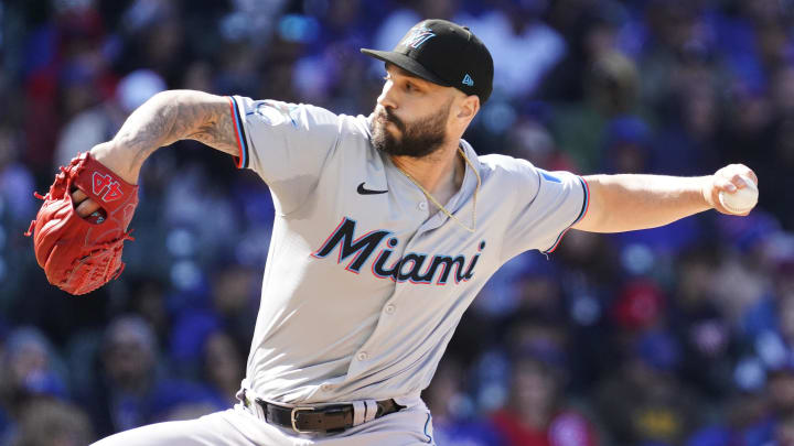 Apr 21, 2024; Chicago, Illinois, USA; Miami Marlins pitcher Tanner Scott (66) throws the ball against the Chicago Cubs during the seventh inning at Wrigley Field.