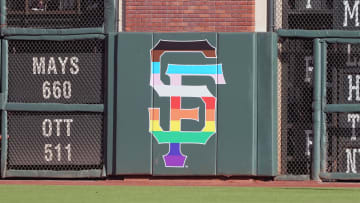 Jun 3, 2023; San Francisco, California, USA;  The San Francisco Giants logo on the left field wall is decorated to commemorate pride month before the game against the Baltimore Orioles at Oracle Park. Mandatory Credit: Darren Yamashita-USA TODAY Sports