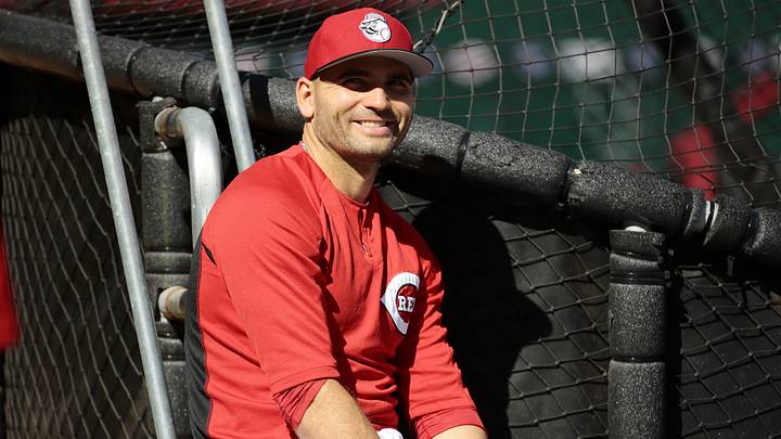 Cincinnati Reds first baseman Joey Votto (19) laughs near the cage during batting practice before the MLB National League game between the Cincinnati Reds and the Chicago Cubs at Great American Ball Park in downtown Cincinnati, on Friday, April 21, 2017.