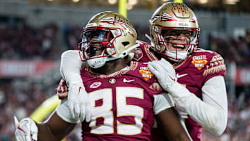 Florida State Seminoles tight end Markeston Douglas (85) and his teammate celebrate a touchdown. The Florida State Seminoles defeated the Oklahoma Sooners 35-32 in the Cheez-It Bowl at Camping World Stadium on Thursday, Dec. 29, 2022.

Fsu V Oklahoma Second Half202a