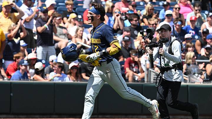 Jun 16, 2026; Omaha, NE, USA;  West Virginia Mountaineers second baseman Gavin Kelly (2) celebrates after hitting a three run home run against the Troy Trojans during the sixth inning at Charles Schwab Field. Mandatory Credit: Steven Branscombe-Imagn Images