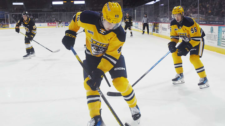 Erie Otters defenseman Matthew Schaefer controls the puck against the Sarnia Sting at Erie Insurance Arena in Erie on Oct. 21, 2023.