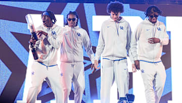 Kentucky Wildcats basketball guard Denzel Aberdeen (1) used a t-shirt cannon to give out free swag to fans during his introduction at the 2025 Big Blue Madness at Rupp Arena in Lexington, Kentucky Saturday, Oct. 11, 2025.