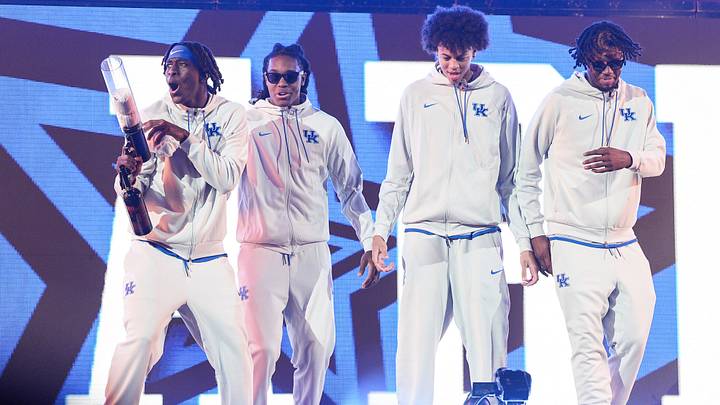 Kentucky Wildcats basketball guard Denzel Aberdeen (1) used a t-shirt cannon to give out free swag to fans during his introduction at the 2025 Big Blue Madness at Rupp Arena in Lexington, Kentucky Saturday, Oct. 11, 2025.