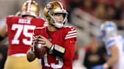 Dec 30, 2024; Santa Clara, California, USA; San Francisco 49ers quarterback Brock Purdy (13) drops back to pass during the first quarter against the Detroit Lions at Levi's Stadium. Mandatory Credit: Sergio Estrada-Imagn Images