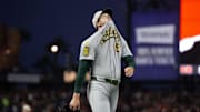 May 17, 2025; San Francisco, California, USA; Athletics pitcher Mason Miller (19) reacts to walking in the winning run against the San Francisco Giants during the tenth inning at Oracle Park. Mandatory Credit: D. Ross Cameron-Imagn Images