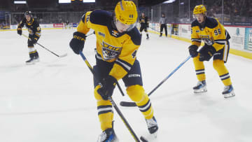 Erie Otters defenseman Matthew Schaefer controls the puck against the Sarnia Sting at Erie Insurance Arena in Erie on Oct. 21, 2023.