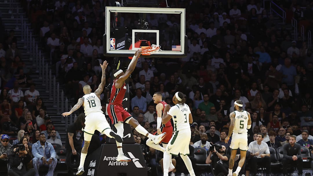 Nov 26, 2025; Miami, Florida, USA; Miami Heat center Bam Adebayo (13) dunks against the Milwaukee Bucks during the first half of an NBA Cup game at Kaseya Center. Mandatory Credit: Rhona Wise-Imagn Images