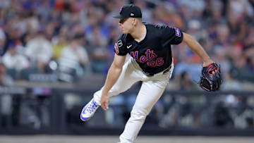Aug 1, 2025; New York City, New York, USA; New York Mets relief pitcher Ryan Helsley (56) follows through on a pitch against the San Francisco Giants during the ninth inning at Citi Field. Mandatory Credit: Brad Penner-Imagn Images