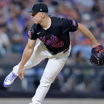 Aug 1, 2025; New York City, New York, USA; New York Mets relief pitcher Ryan Helsley (56) follows through on a pitch against the San Francisco Giants during the ninth inning at Citi Field. Mandatory Credit: Brad Penner-Imagn Images