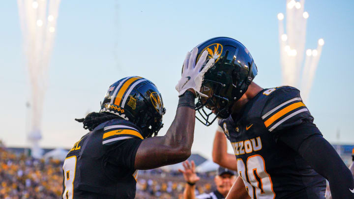 Aug 29, 2024; Columbia, Missouri, USA; Missouri Tigers running back Nate Noel (8) celebrates with tight end Tyler Stephens (80) after scoring against the Murray State Racers at Faurot Field.