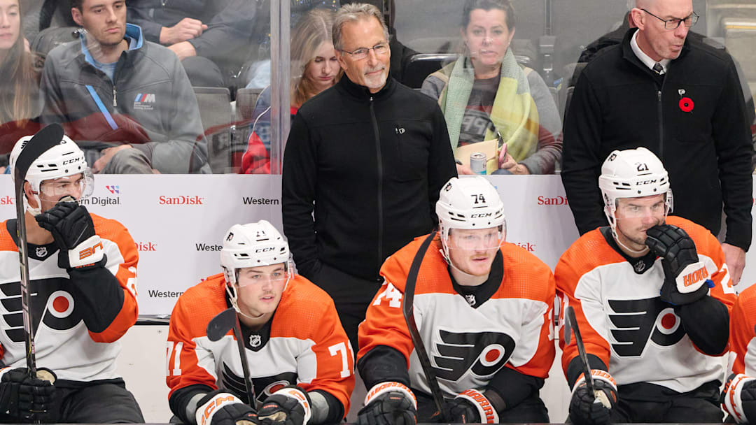 Nov 7, 2023; San Jose, California, USA; Philadelphia Flyers head coach John Tortorella watches the play against the San Jose Sharks from the bench during the third period at SAP Center at San Jose. Mandatory Credit: Robert Edwards-Imagn Images