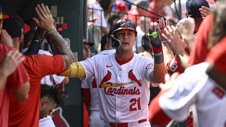 Aug 18, 2024; St. Louis, Missouri, USA; St. Louis Cardinals right fielder Lars Nootbaar (21) is congratulated after hitting a solo home run against the Los Angeles Dodgers in the eighth inning at Busch Stadium. Mandatory Credit: Joe Puetz-USA TODAY Sports