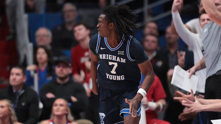 BYU Cougars forward Khadim Mboup (7) sinks a three-pointer against Kansas Jayhawks during the game inside Allen Fieldhouse on Jan. 31, 2026.