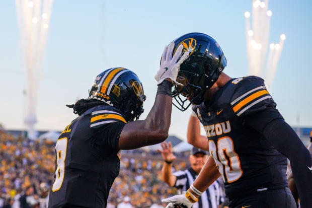 Missouri Tigers running back Nate Noel celebrates with tight end Tyler Stephens after scoring against the Murray State Racers