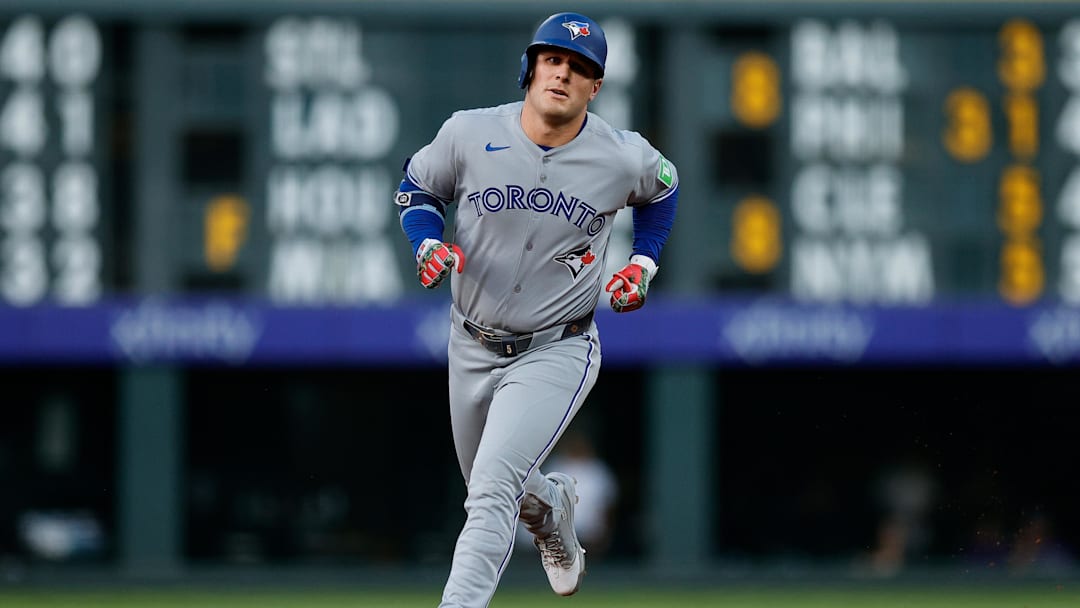 Aug 4, 2025; Denver, Colorado, USA; Toronto Blue Jays center fielder Daulton Varsho (5) rounds the bases on a three run home run in the third inning against the Colorado Rockies at Coors Field. 