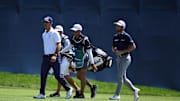 Aug 25, 2024; Castle Rock, Colorado, USA; Billy Horschel and Will Zalatoris  walk up the fairway on the 18th hole during the final round of the BMW Championship golf tournament at Castle Pines Golf Club. Mandatory Credit: Christopher Hanewinckel-Imagn Images