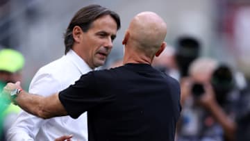 Stefano Pioli, head coach of Ac Milan (R),  shakes hands...