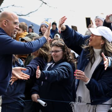 Penn State coach James Franklin greets fans at the 2024 Blue-White Game at Beaver Stadium.