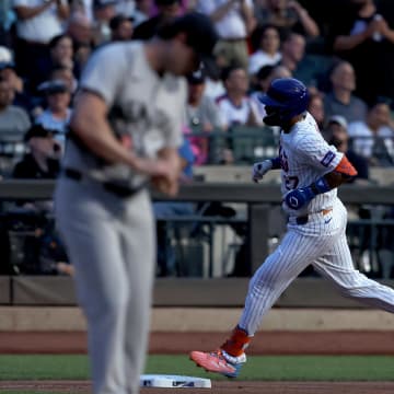 New York Mets third baseman Mark Vientos (27) rounds the bases after hitting a solo home run against New York Yankees starting pitcher Gerrit Cole (45) during the fourth inning at Citi Field on June 25.