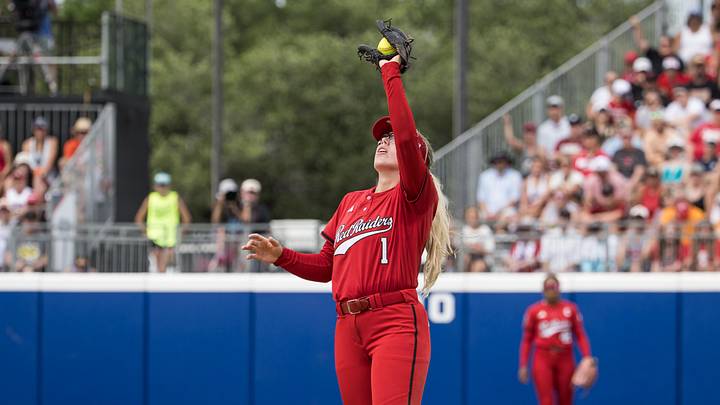 May 30, 2026; Oklahoma City, OK, USA;  Texas Tech Red Raiders second baseman Mia Williams (1) makes a catch for an out in the fifth inning against the Tennessee Lady Volunteers during the NCAA Women’s College World Series at Devon Park. Mandatory Credit: Brett Rojo-Imagn Images