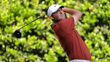 Scottie Scheffler tees off during the opening round of the 2025 PGA Championship at Quail Hollow Club