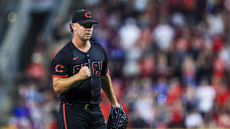Sep 19, 2025; Cincinnati, Ohio, USA; Cincinnati Reds relief pitcher Emilio Pagan (15) reacts after the victory over the Chicago Cubs at Great American Ball Park. Mandatory Credit: Katie Stratman-Imagn Images