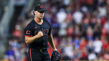 Sep 19, 2025; Cincinnati, Ohio, USA; Cincinnati Reds relief pitcher Emilio Pagan (15) reacts after the victory over the Chicago Cubs at Great American Ball Park. Mandatory Credit: Katie Stratman-Imagn Images