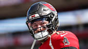 Jan 5, 2025; Tampa, Florida, USA; Tampa Bay Buccaneers quarterback Baker Mayfield (6) looks on before a game against the New Orleans Saints at Raymond James Stadium. Mandatory Credit: Nathan Ray Seebeck-Imagn Images