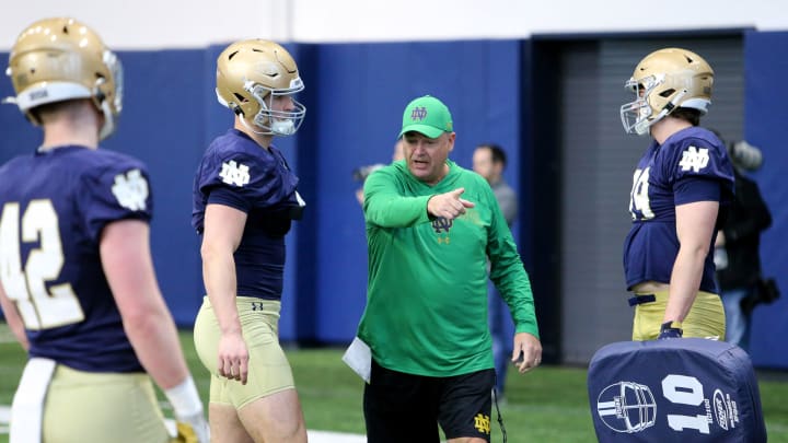 Notre Dame Offensive Coordinator Mike Denbrock talks to players at Notre Dame spring football practice Thursday, March 7, 2024, at the Irish Athletics Center in South Bend.