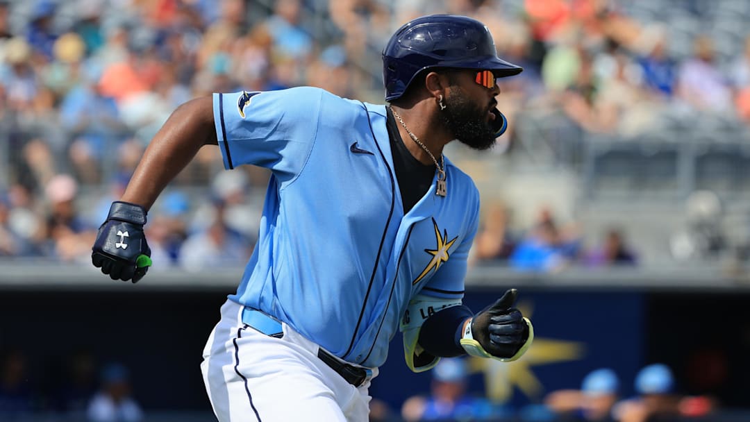 Feb 27, 2026; Port Charlotte, Florida, USA; Tampa Bay Rays third baseman Junior Caminero (13) hits a two-run single during the first inning against the Toronto Blue Jays at Charlotte Sports Park. Mandatory Credit: Kim Klement Neitzel-Imagn Images