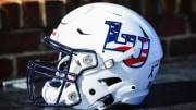 Nov 11, 2023; Lynchburg, Virginia, USA; A Liberty Flames helmet before a game at Williams Stadium. Mandatory Credit: Brian Bishop-USA TODAY Sports