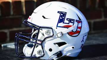 Nov 11, 2023; Lynchburg, Virginia, USA; A Liberty Flames helmet before a game at Williams Stadium. Mandatory Credit: Brian Bishop-Imagn Images