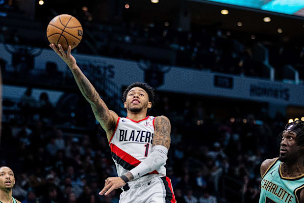 Portland Trail Blazers guard Anfernee Simons (1) shoots against the Charlotte Hornets