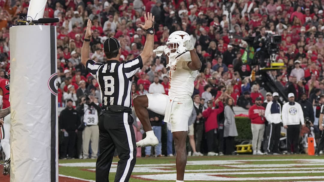 Texas Longhorns wide receiver Ryan Wingo (1) celebrates scoring a touchdown in the second half against the Georgia Bulldogs at Sanford Stadium. Mandatory Credit: Dale Zanine-Imagn Images