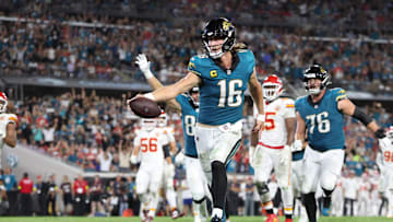 Oct 6, 2025; Jacksonville, Florida, USA; Jacksonville Jaguars quarterback Trevor Lawrence (16) scores a touchdown during the second half against the Kansas City Chiefs at EverBank Stadium. Mandatory Credit: Nathan Ray Seebeck-Imagn Images