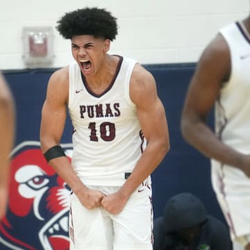 Perry Pumas forward Koa Peat (10) screams out after a dunk against the Basha Bears at Perry High School in Gilbert on Jan. 6, 2024.