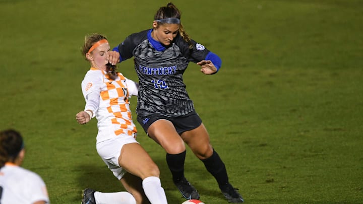 Tennessee midfielder Jenna Chatterton (17) tries to steal the ball from Kentucky midfielder Gretchen Mills (12) in the NCAA women's soccer match between the Tennessee Lady Vols and Kentucky Wildcats in Knoxville, Tenn. on Thursday, October 28, 2021.

Kns Lady Vols Soccer