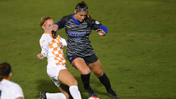 Tennessee midfielder Jenna Chatterton (17) tries to steal the ball from Kentucky midfielder Gretchen Mills (12) in the NCAA women's soccer match between the Tennessee Lady Vols and Kentucky Wildcats in Knoxville, Tenn. on Thursday, October 28, 2021.

Kns Lady Vols Soccer