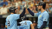 Outfielder Josh Lowe (right ) returns to the lineup on Thursday for the Tampa Bay Rays. He's been out with an oblique injury since Opening Day. 