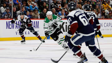 Jan 18, 2025; Denver, Colorado, USA; Dallas Stars center Logan Stankoven (11) controls the puck against left wing Jere Innala (22) and defenseman Keaton Middleton (67) and center Parker Kelly (17) in the third period at Ball Arena. Mandatory Credit: Isaiah J. Downing-Imagn Images