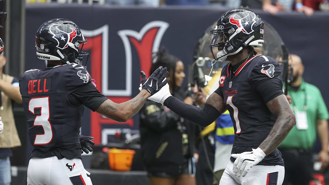 Oct 27, 2024; Houston, Texas, USA; Houston Texans wide receiver Tank Dell (3) celebrates with wide receiver Stefon Diggs (1) after scoring a touchdown during the second quarter against the Indianapolis Colts at NRG Stadium. Mandatory Credit: Troy Taormina-Imagn Images
